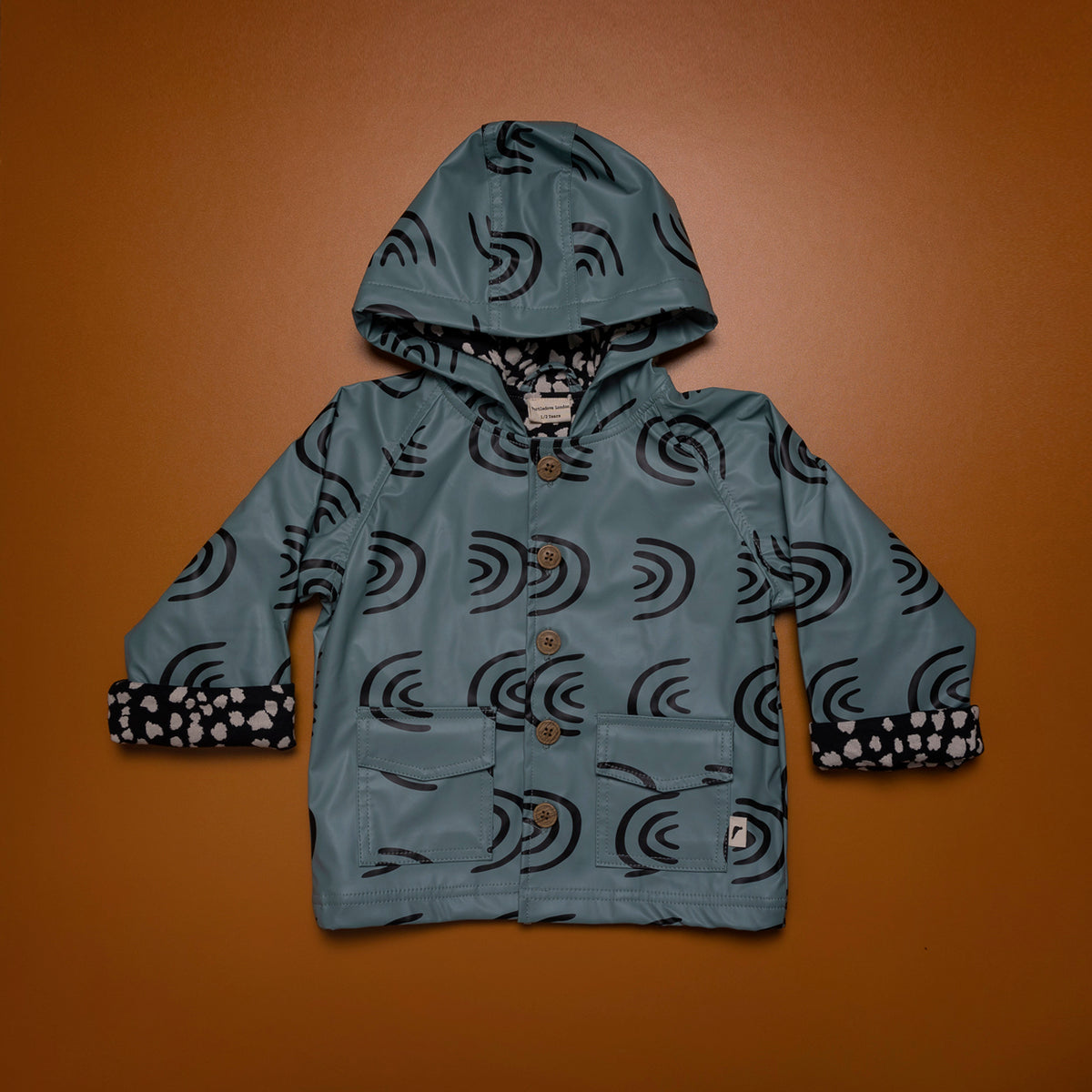 Dream in Color Ruffled Hooded Raincoat